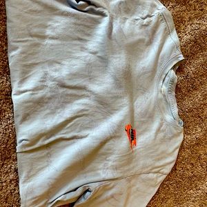 Light blue medium Nike shirt